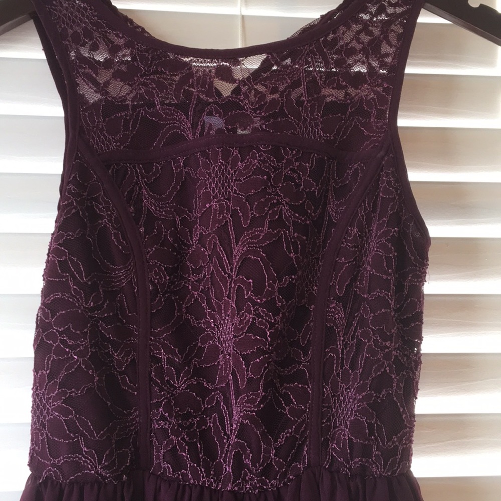 Francesca burgundy dress with lace details.